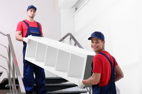 Kingston removal company team loading furniture for a nearby relocation