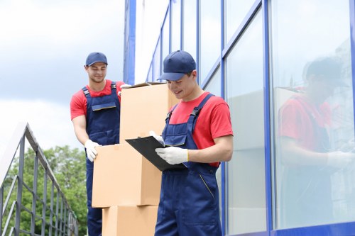 House move with boxes and protective wrapping in Kingston