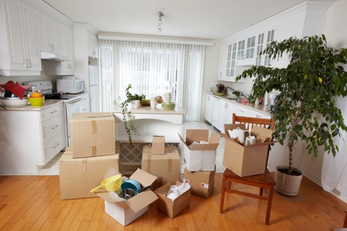 Local removal van team loading items for a Kingston move