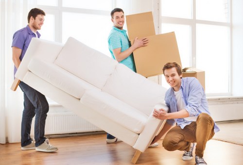 Commercial furniture and equipment being prepared for a Kingston office move