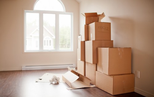Professional movers handling furniture during a house removal in Kingston