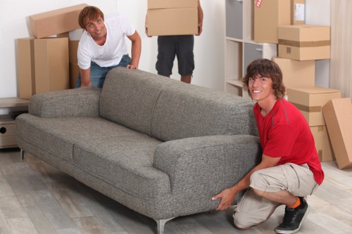 Bulky furniture being dismantled for reuse and recycling