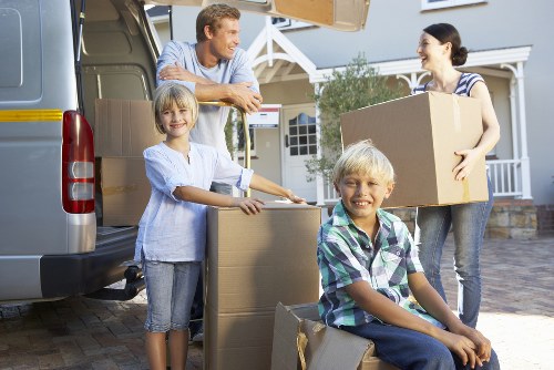 Packing materials and labelled boxes prepared for a Kingston home move