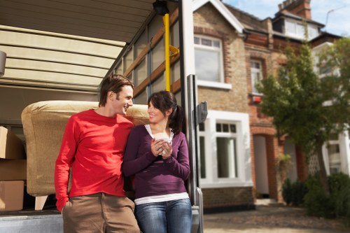 Moving van navigating busy Kingston streets and loading areas