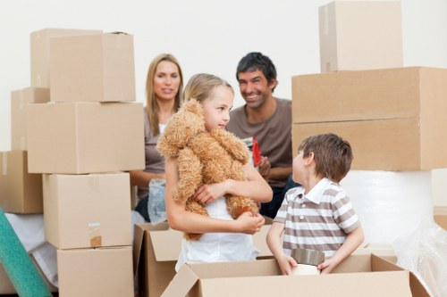 Moving boxes and furniture arranged for Kingston removal service